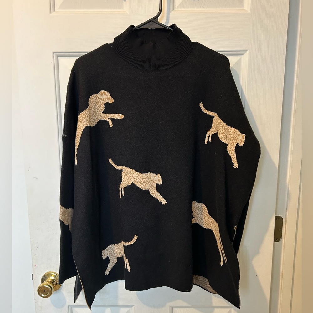 ENTRO brand. Size small. Black with leopards